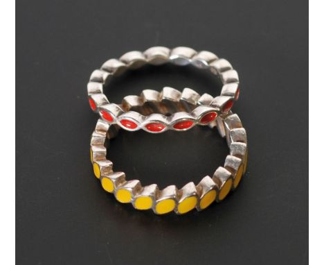 PANDORA, TWO ENAMELLED SILVER TWIST RINGS, yellow and red enamel, S925 ALE 55, 925 ALE, P and Q, 7.4g gross (2)