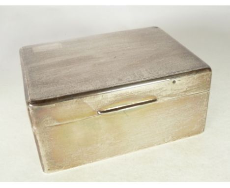 SILVER CASED TABLE CIGARETTE BOX, with engine turned lid, Birmingham 1934, 4 1/2" x 3 1/"2 x 2" (11.4cm x 8.9cm x 5cm)