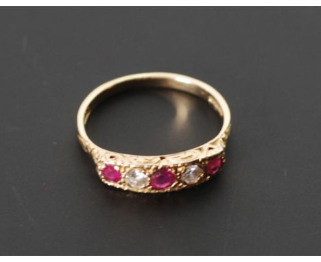 18CT GOLD RUBY AND DIAMOND RING, gypsy set with two brilliant cut diamonds, each 0.10ct approx. estimated total carat weight 