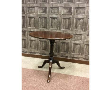 GEORGE III MAHOGANY TILT TOP TEA TABLE, of circular form, with baluster shaped column and tripod supports, 72cm diameter