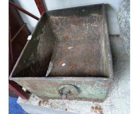 An antique iron Planter