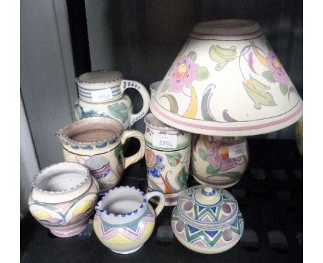 Honiton Pottery; eight pieces, various designs including Jacobean pattern lamp base, two vases, a pot etc, impressed 'Collard