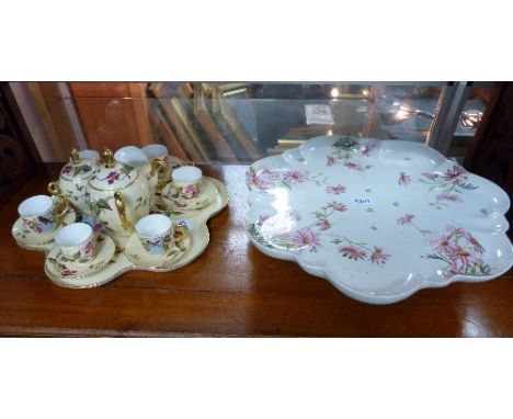 A sixteen piece porcelain Tea Service and tray, together with a ceramic lazy Susan (17)
Provenance: Stoodley Knowle School, T