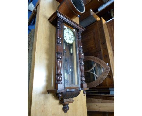 A Victorian mahogany wall Clock