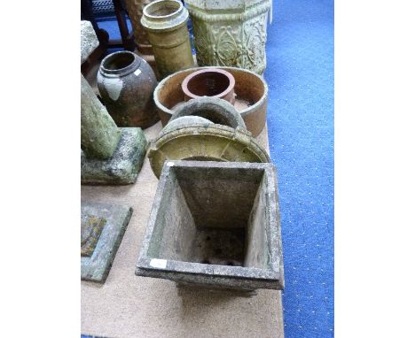 A square stone Planter with moulded sides, together with three other planters and four bases (8)