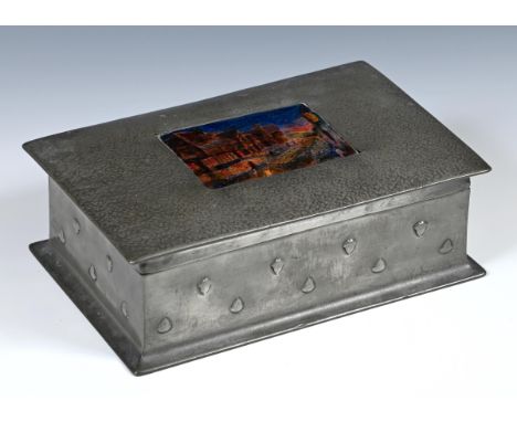 A Liberty Tudric cigarette box, the lid applied an enamel panel decorated a street scene, numbered 078, 21 cm wide7 cm high, 