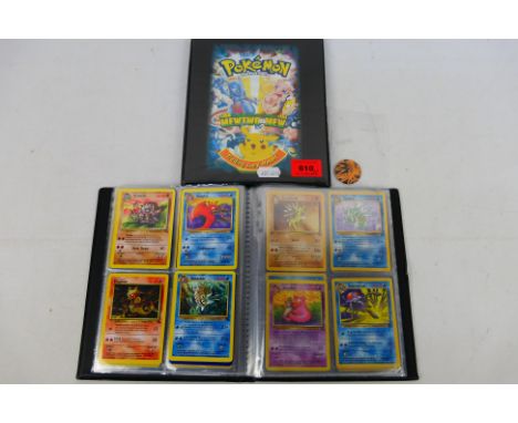 Pokemon - Nearly Complete Fossil card set (missing 2/62 & 4/62) in an original Pokemon The First Movie Official 4 x Pocket Al