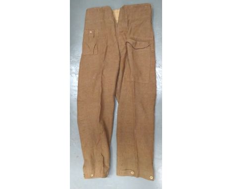 Pair Of 1937 Pattern Battledress Trousers khaki woollen, wide leg trousers. &nbsp;Right hip with first aid pocket. &nbsp;Fron