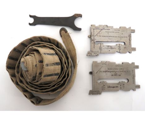 Four Germanic Gun Accessories consisting canvas and steel, 100 round machine gun belt ... 2 x M95 adjusting tools. &nbsp;One 