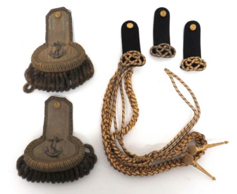 Royal Navy Aiguillettes And Shoulder Boards consisting gilt and blue cord aiguillette with gilt and silvered lower terminals.