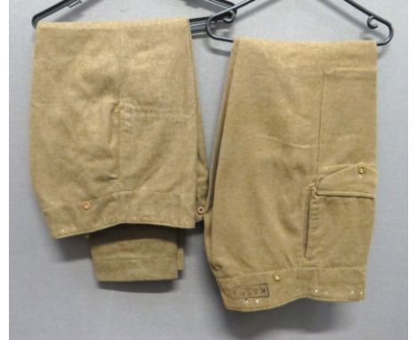 Two Pairs Of 1946 Pattern Battledress Trousers consisting khaki, woollen, wide leg trousers. &nbsp;Right hip with first aid p