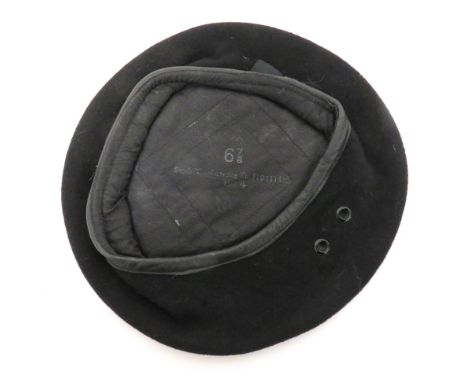 WW2 Dated Black Beret black woollen beret. &nbsp;Lower black leather sweatband. &nbsp;Large side vent holes. &nbsp;Cotton lin