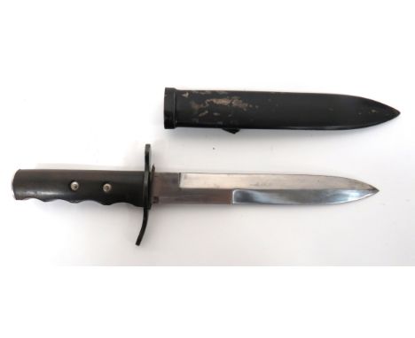 WW2 Italian Fascist Dagger 8 1/4 inch, offset, double edged blade. &nbsp;Blackened steel, turn up end crossguard. &nbsp;Black