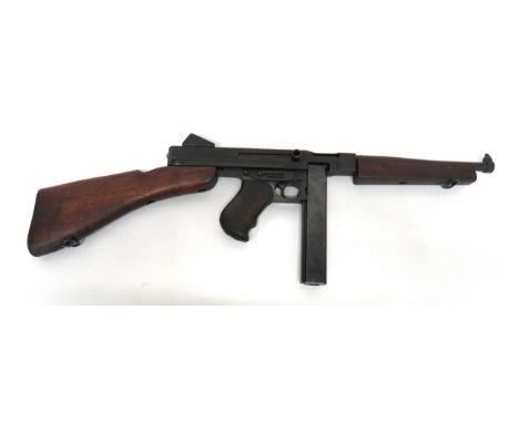 Deactivated US Model MIAI Thompson SMG .45 ACP, 11 inch, blackened barrel with blade sight. &nbsp;Blackened, square form body