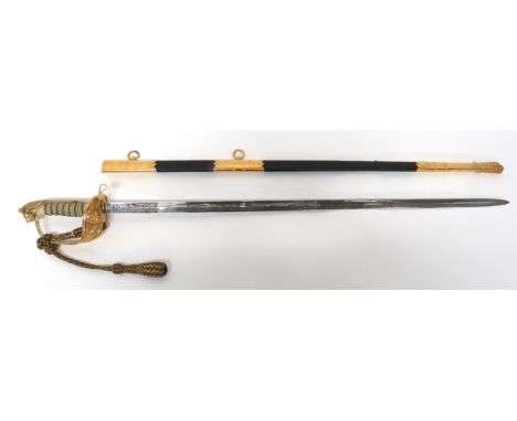 Elizabeth II Royal Navy Officer's Sword By Wilkinson 31 inch, single edged blade with fuller. &nbsp;Etched oak leaf and rope 