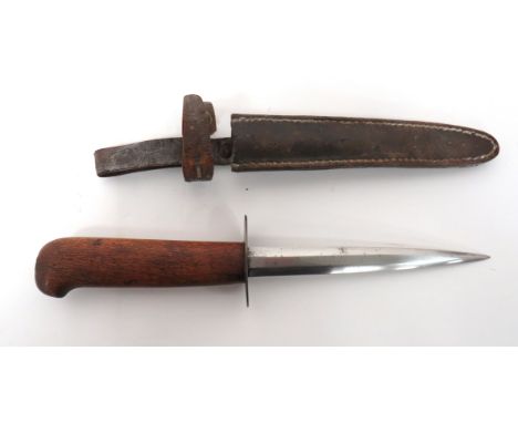 WW1 French Combat Trench Knife 6 inch, double edged blade. &nbsp;Steel, oval disc crossguard with small maker's stamp. &nbsp;