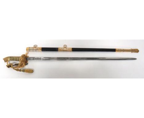 Elizabeth II Royal Navy Officer's Sword By Wilkinson 31 inch, single edged blade with fuller. &nbsp;Etched oak leaf and rope 