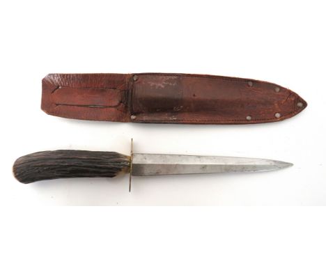 Commercial Fairbairn-Sykes Fighting Knife 6 1/2 inch, double edged blade. &nbsp;Oval, brass crossguard. &nbsp;Polished antler