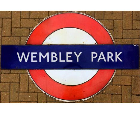 London Underground enamel STATION BULLSEYE SIGN for Wembley Park on the Metropolitan and Jubilee (formerly Bakerloo) lines. T