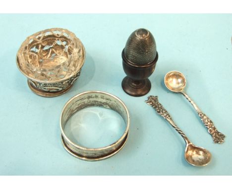 A miniature engine-turned silver egg, 3cm high with small treen egg cup, a silver napkin ring and other small items of silver