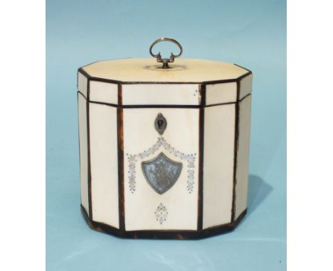 A Georgian ten-sided ivory, tortoiseshell and mother-of-pearl inlay tea caddy with white metal mounts, 11cm high, 11cm wide, 