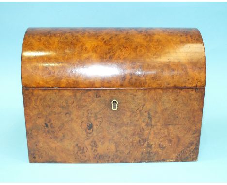 A burr walnut two-division tea caddy, the domed lid enclosing two lidded compartments, 22cm wide, 18cm high.