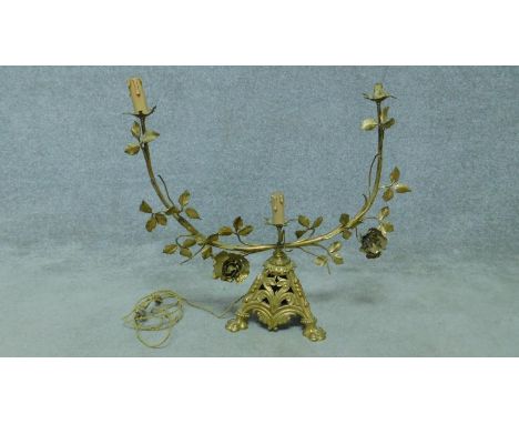 A 19th century brass three branch candelabra with leaf and foliate decoration. 60x56cm 