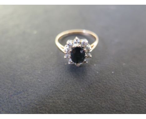 A 9ct yellow gold sapphire and diamond ring size O - approx weight 2.4 grams - light usage wear and scratches