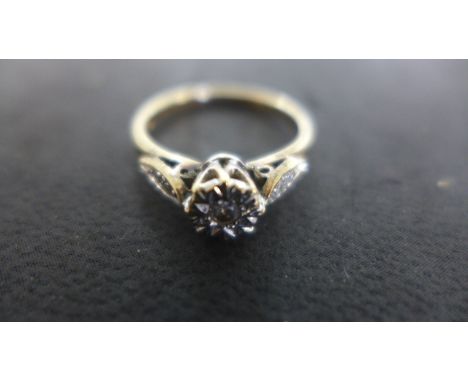 A 9ct Yellow Gold Diamond Solitaire Ring, five small diamonds set to shoulder, size K, approx 2.2 grams, some light surface s