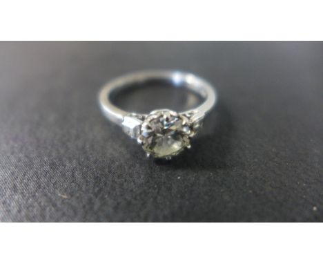 A Platinum Diamond Ring, incorporating a single round brilliant cut diamond, size approximately 6.1 x 3.5 mm, carat weight ca