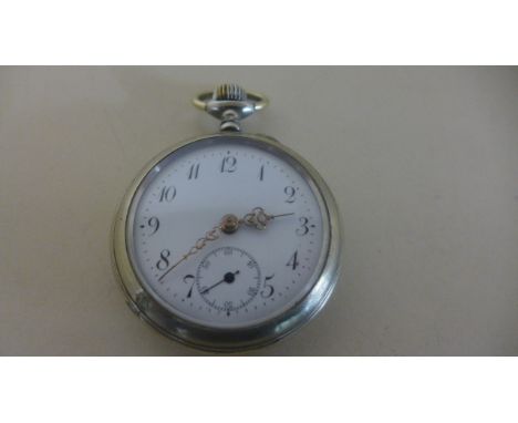 A French Silver Plated Open Faced Pocket Watch - Arabic numerals to white enamel dial with subsidiary seconds at 6 O' Clock