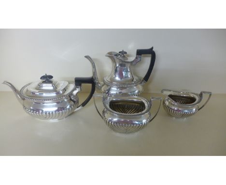 A silver four piece tea service, mixed makers and dates, tea-pot - London 1900/01, coffee pot 1899/1900 both G&S Co Ltd, suga