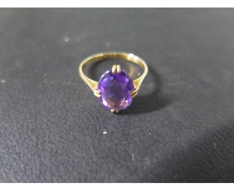 An 18ct yellow gold amethyst single stone ring size L - approx stone size 11.5mm x 9mm x 5mm - weight approx 2.3 grams - good