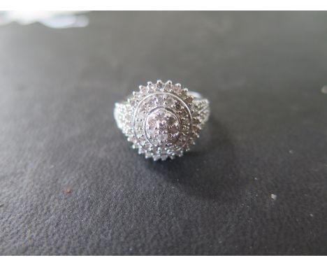 A sterling silver and diamond cluster ring - approx total diamond weight 1ct - ring size L - approx weight 4.5 grams - in goo