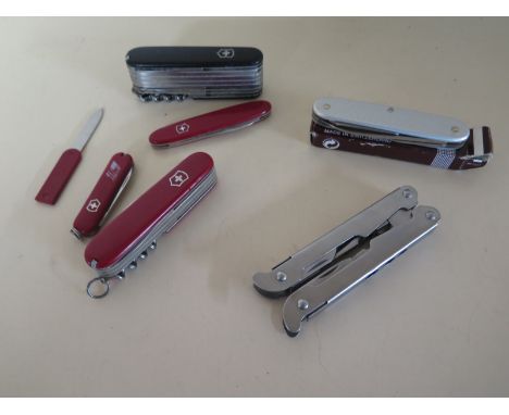 Five Swiss Army Penknives and a Steel Multi-Tool