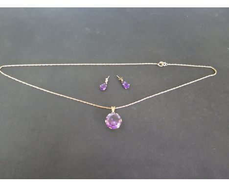 A 9ct Yellow Gold Amethyst Pendant and Earrings - the pendant on 18ct Yellow Gold Chain - total weight 12.6 grams - in good c