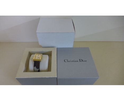 A Christian Dior Ladies Quartz Wristwatch with camouflage strap and box - some wear to box and strap - working in saleroom
