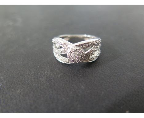 A sterling silver diamond ring size L - approx weight 3.3 grams - in good condition with certificate