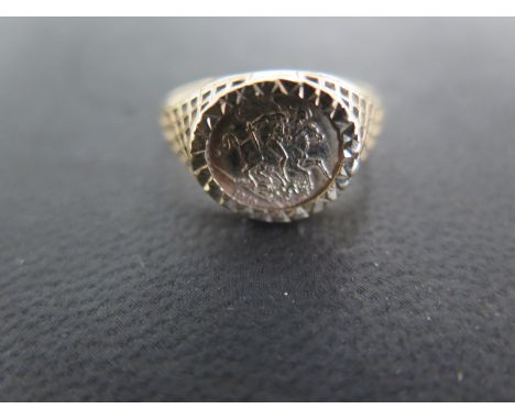 A 9ct yellow gold signet ring with gold coin set - size M - approximately 1.8 grams - in good condition with minor usage wear