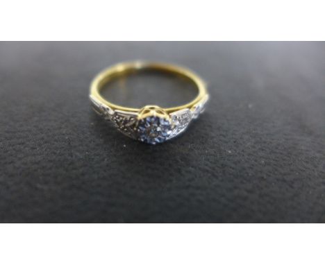 An 18ct Yellow Gold Platinum and Diamond Ring, size N, approx 1.9 grams - usage wear and light scratches