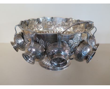 A silver plated punch bowl with a ladle and twelve cups - Height 20cm x Diameter 32cm - some plate wear, one cup handle broke