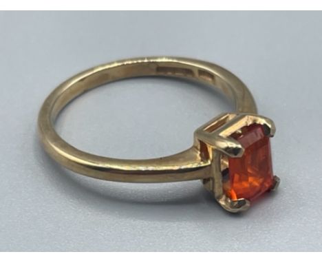 Ladies 9ct gold emerald cut fire opal ring set in a 4 claw setting 2.31g size M1/2