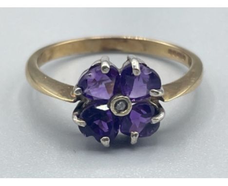 Ladies 9ct gold amethyst and diamond ring. 2g size L1/2