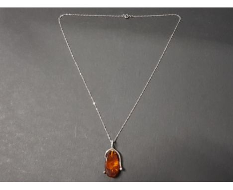 Silver, oval amber pendant and chain, 5.5G gross