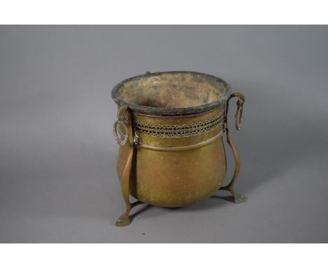 An Arts and Crafts Influenced Brass Planter with Pierced Rim and 3 Supports, Together with Metal Liner. 21cms High. 
