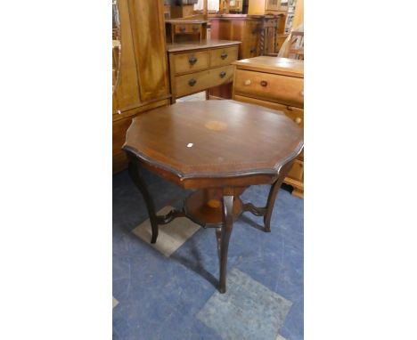 An Edwardian Inlaid Mahogany Octagonal Table with Stretcher Shelf. 