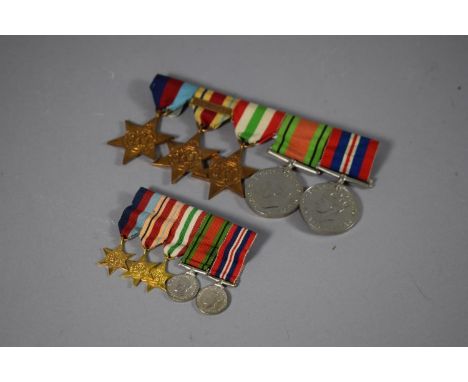 A Set of World War II Medals to Include Africa Star with 8th Army Bar and Matching Miniatures. 
