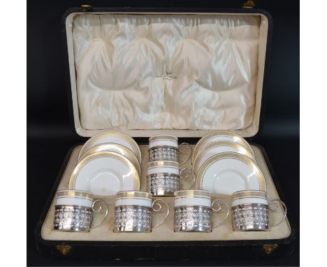 Cased set of Wedgwood coffee cans &amp; saucers (pattern number Z4961) with pierced silver holders, Walker &amp; Hall, Sheffi