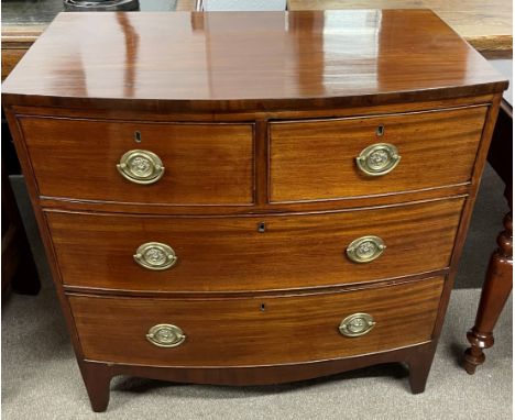 Georgian bow fronted chest of drawers on bracket feet in mahogany with plate brass handles W 88cm Ht 88cm D 50cm