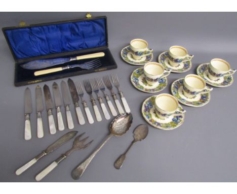 Crown Ducal 'Florentine' cups and saucers, cased fish knife and fork servers, cake knives and forks with pearl effect handles